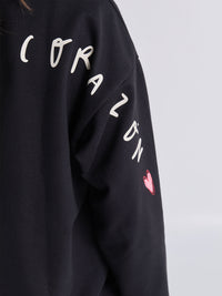 Buzo Abrazo al corazón - Negro